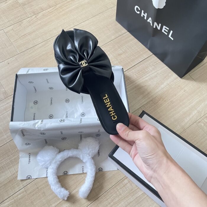 Chanel Bow Embellished Slides In Black - Image 3