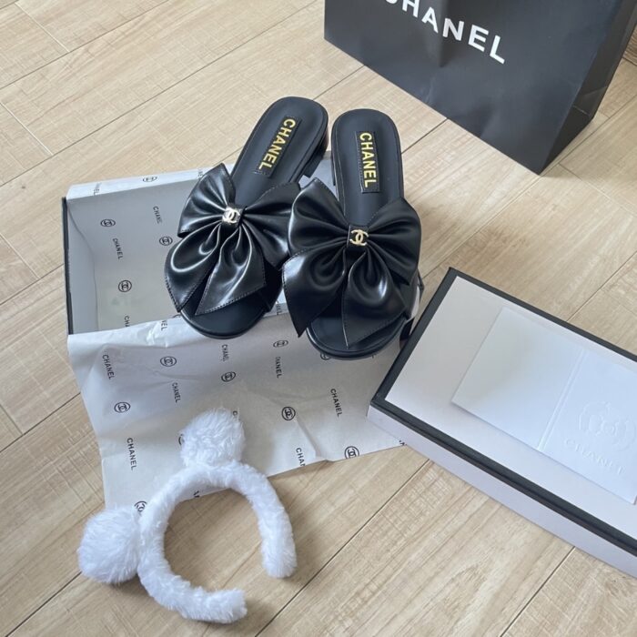 Chanel Bow Embellished Slides In Black - Image 6